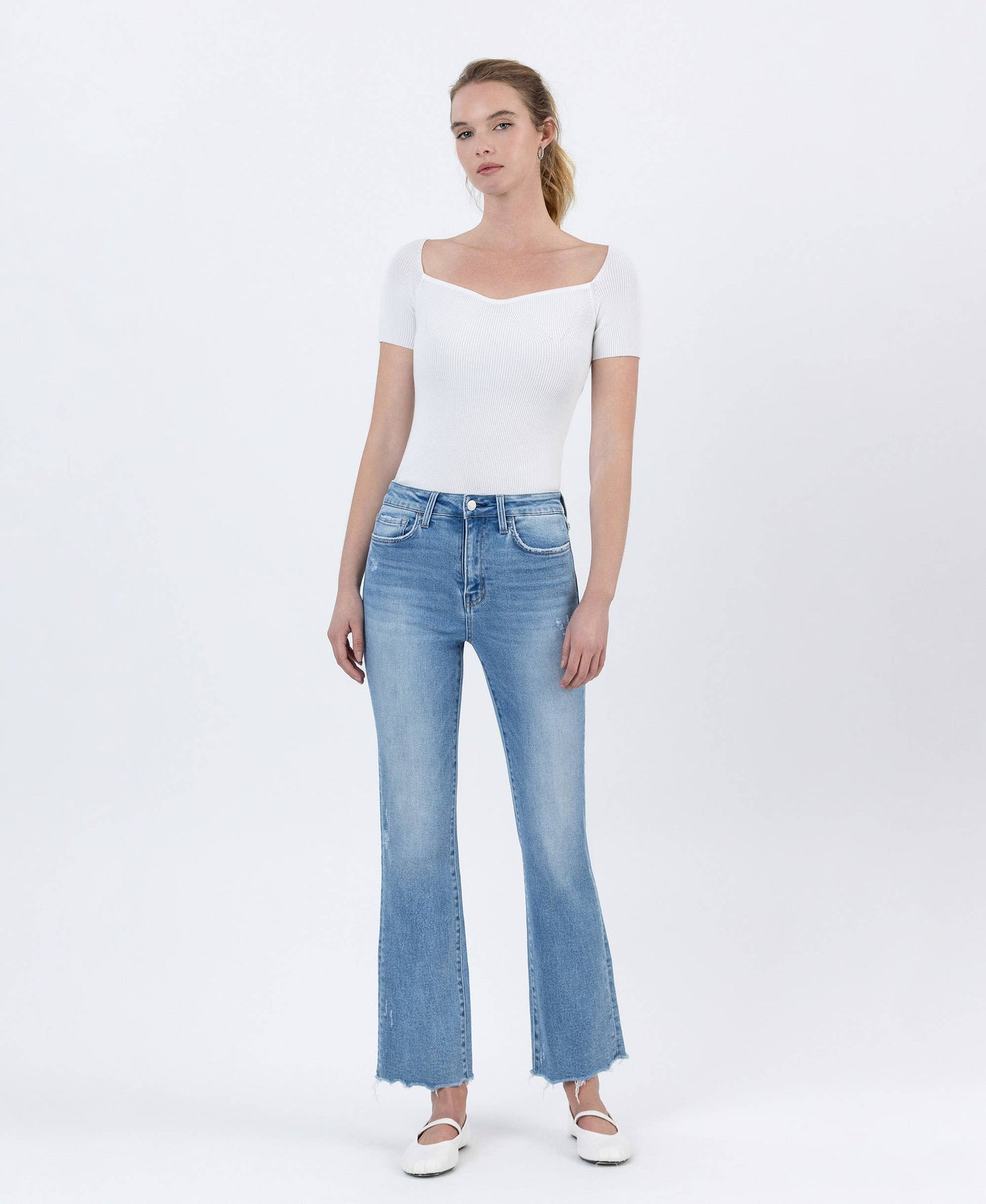 High Rise Light Wash Uneven Raw Hem Kick Flare Denim by Lovervet