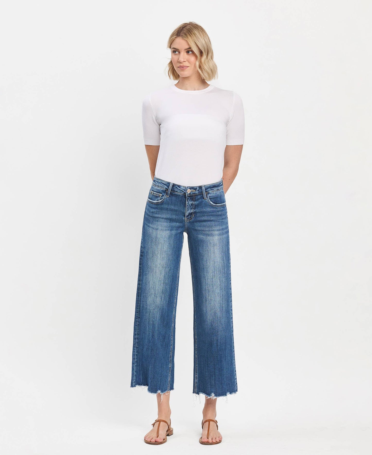 Mid Rise Raw Hem Medium Wash Wide Leg Denim by Lovervet