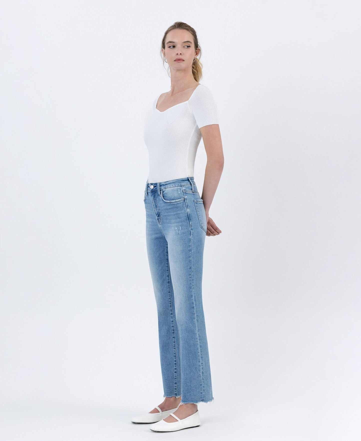 High Rise Light Wash Uneven Raw Hem Kick Flare Denim by Lovervet