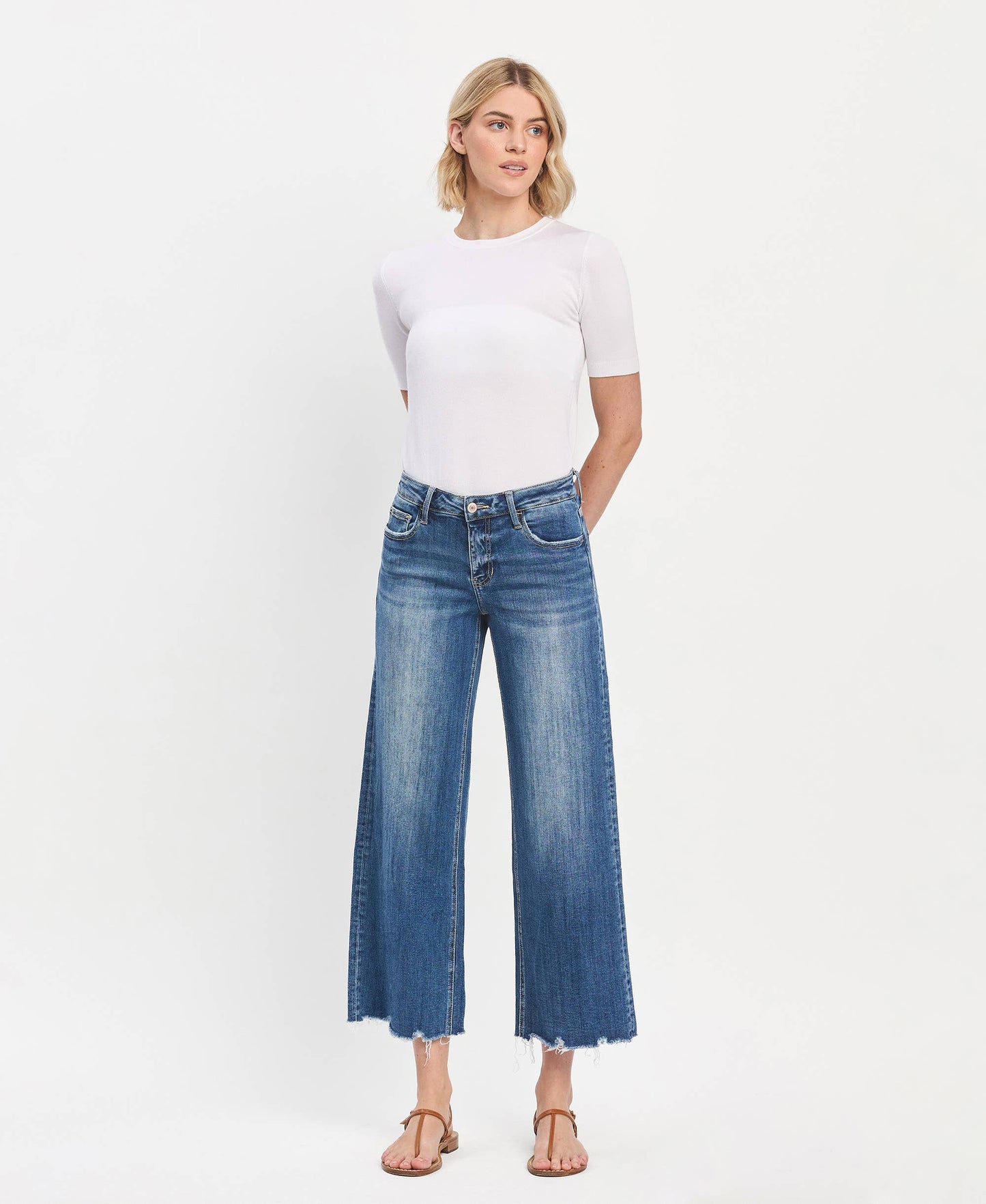 Mid Rise Raw Hem Medium Wash Wide Leg Denim by Lovervet