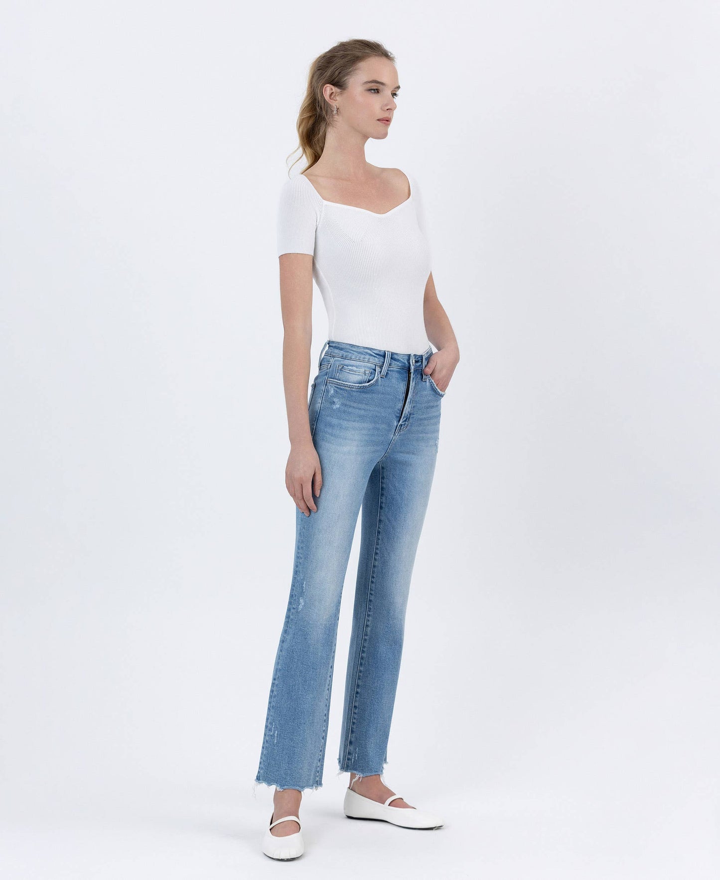 High Rise Light Wash Uneven Raw Hem Kick Flare Denim by Lovervet
