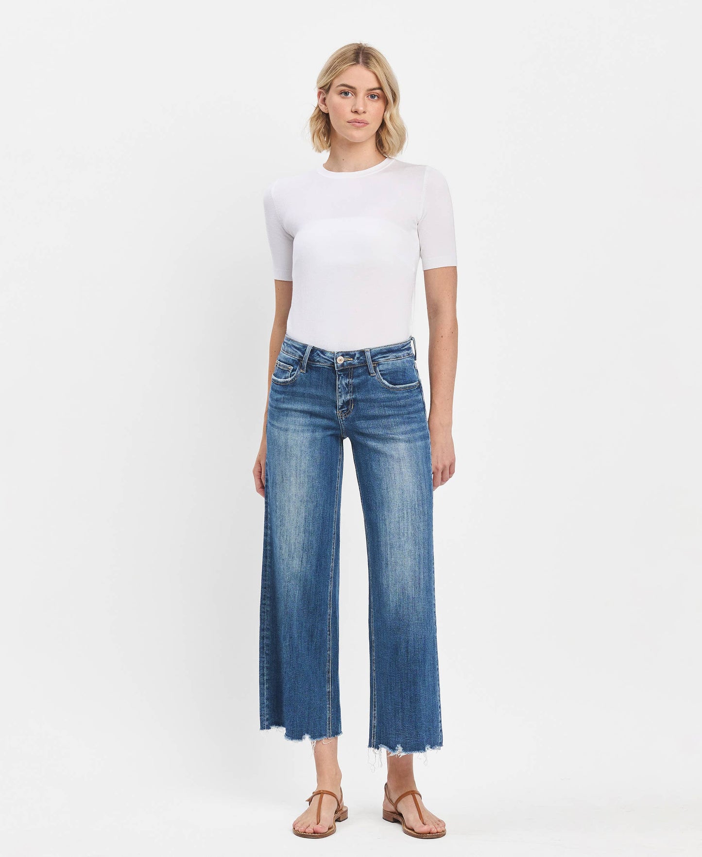 Mid Rise Raw Hem Medium Wash Wide Leg Denim by Lovervet