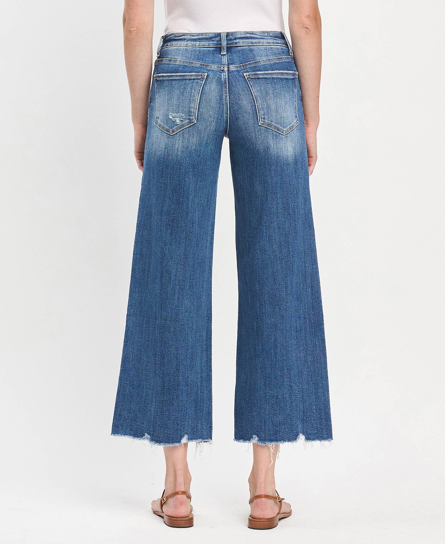 Mid Rise Raw Hem Medium Wash Wide Leg Denim by Lovervet