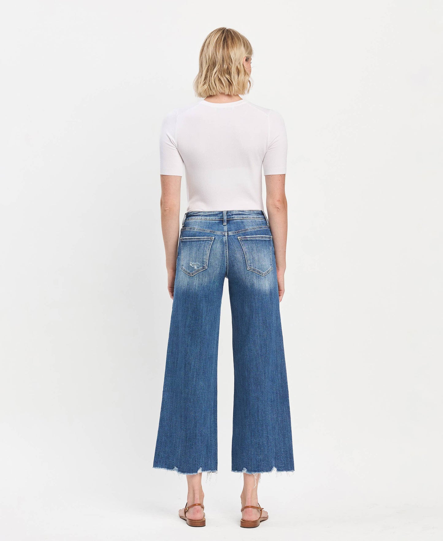 Mid Rise Raw Hem Medium Wash Wide Leg Denim by Lovervet