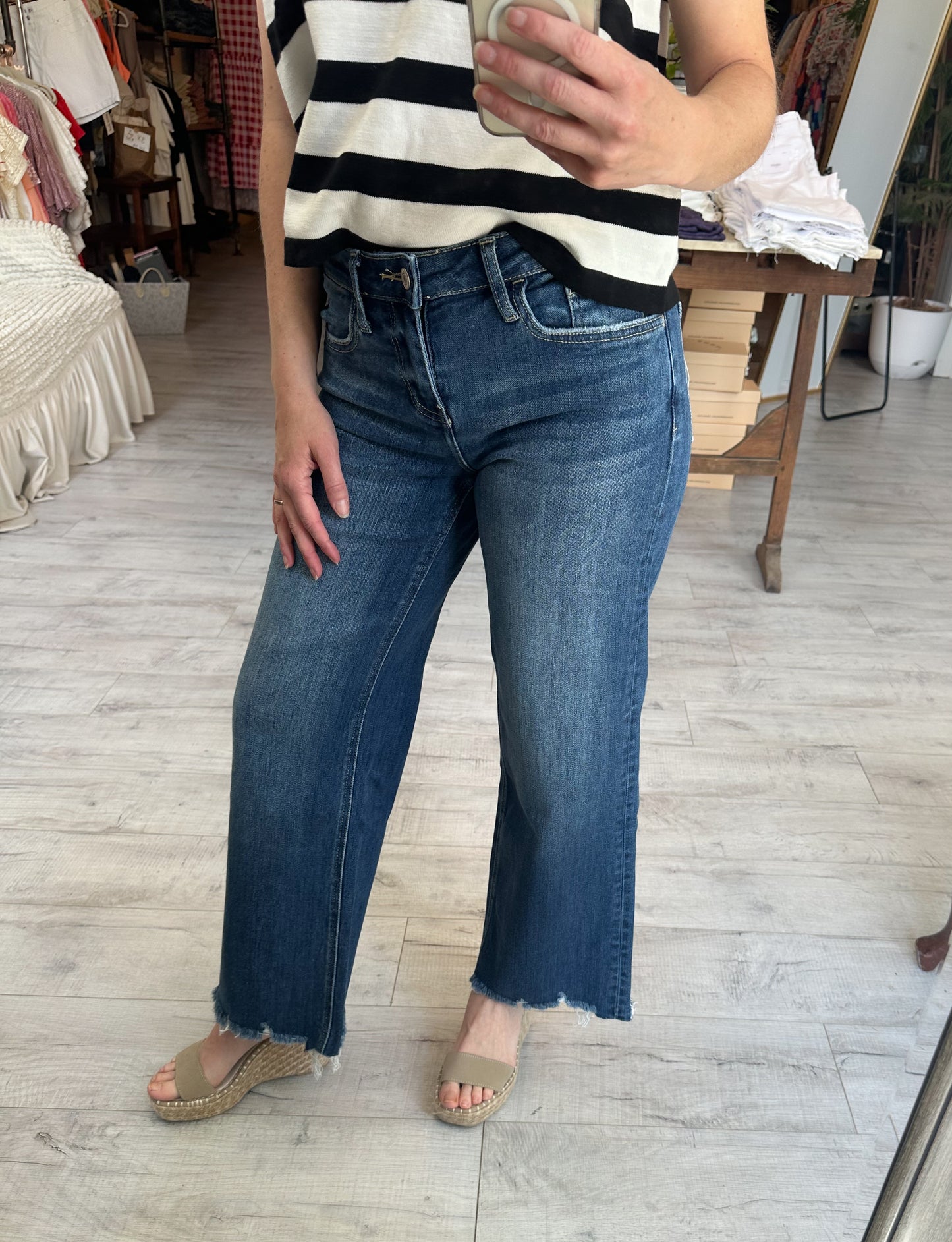 Mid Rise Raw Hem Medium Wash Wide Leg Denim by Lovervet