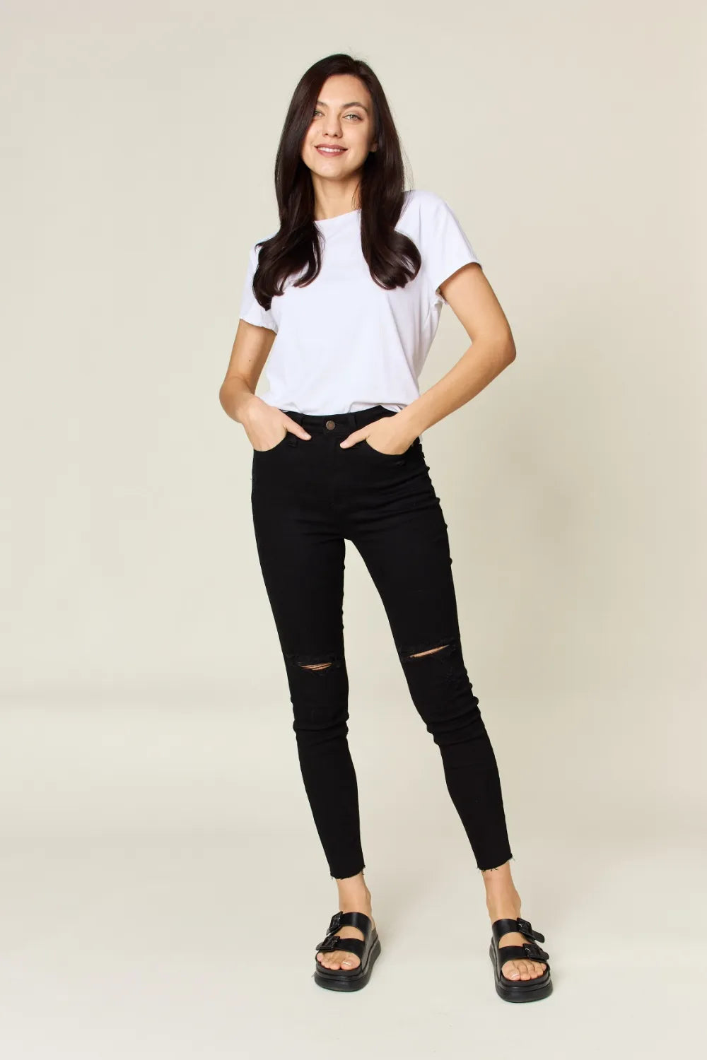 High Rise Control Top Release Hem Skinny in Black