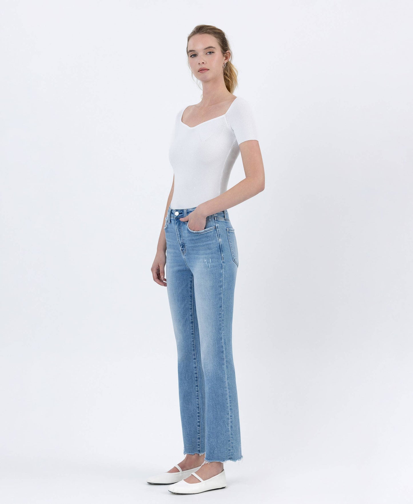 High Rise Light Wash Uneven Raw Hem Kick Flare Denim by Lovervet